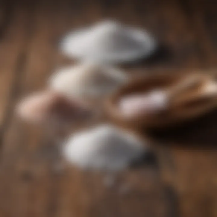 A close-up of different types of salt on a wooden table